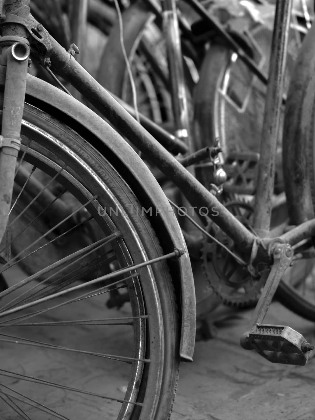 ABSTRACT SHOT OF OLD RUSTY BICYCLE PARTS by PrettyTG