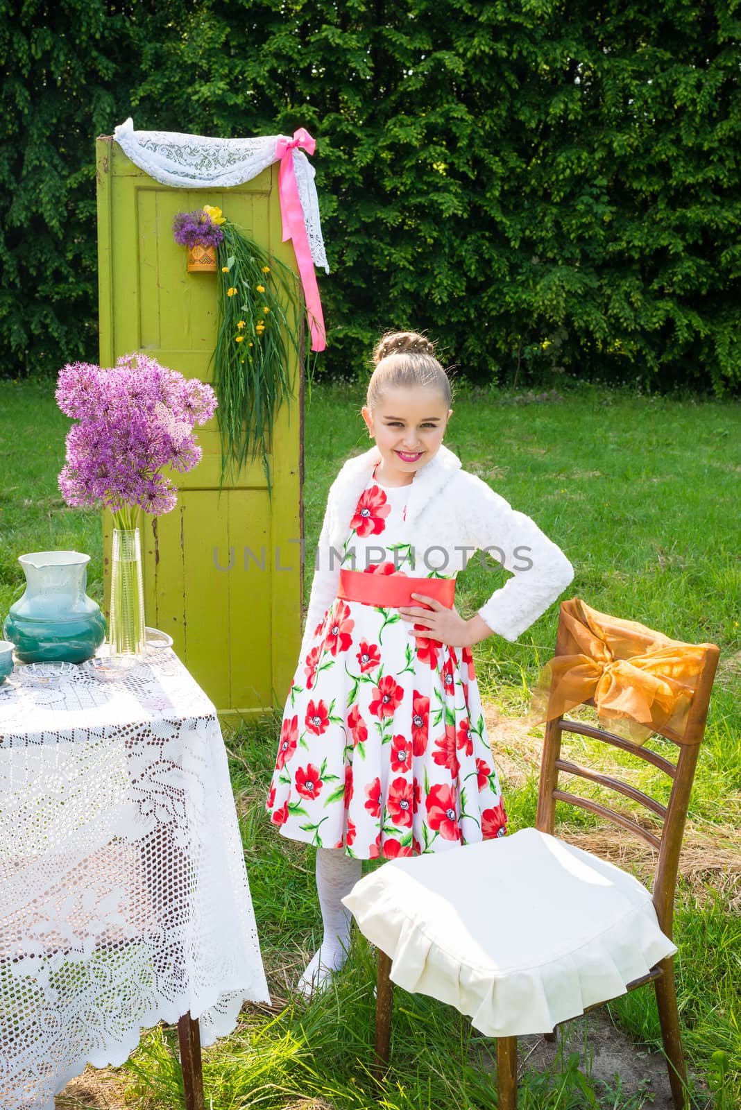 beautiful girl has breakfast in the Green Garden