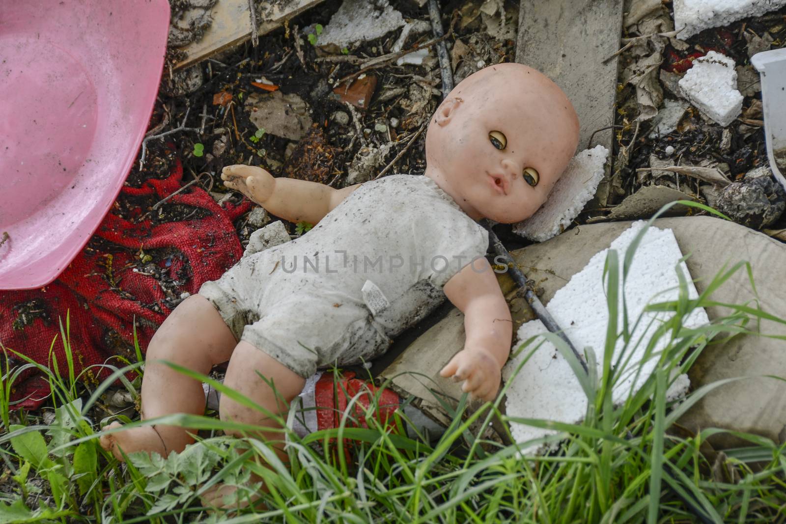 doll lies abandoned on a garbage dump by itsajoop