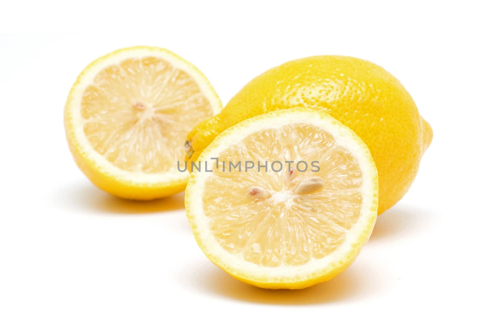 Lemons isolated on white background by myyaym