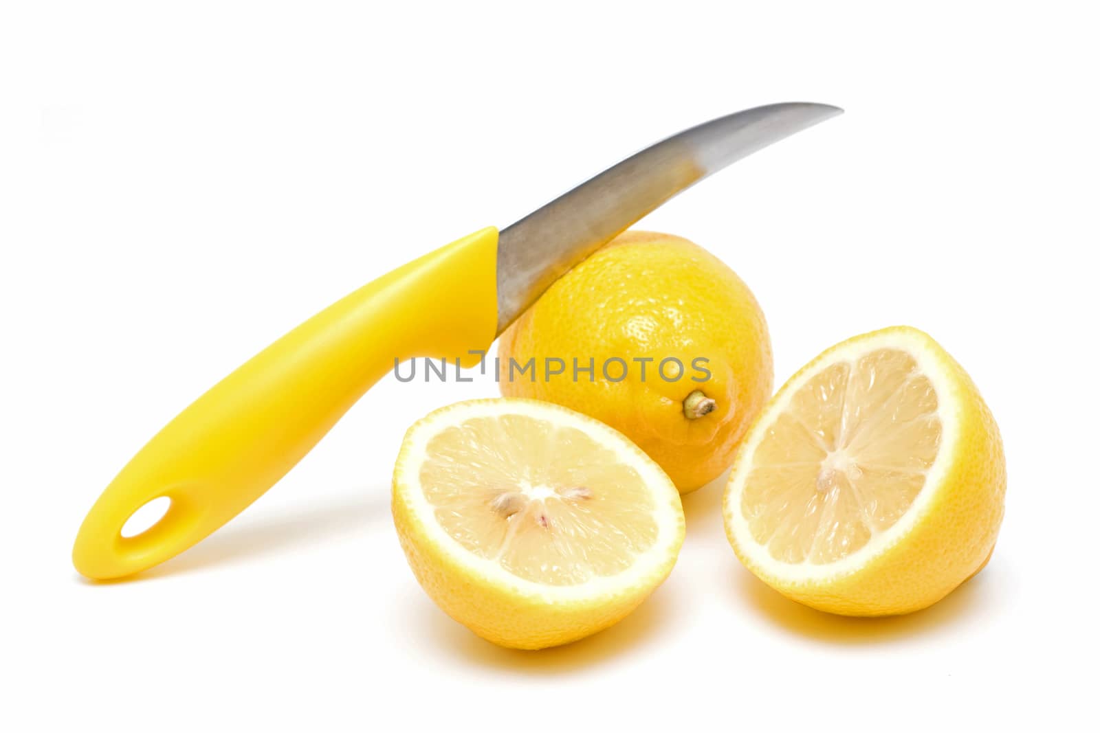 Lemons and Knife isolated on white background by myyaym