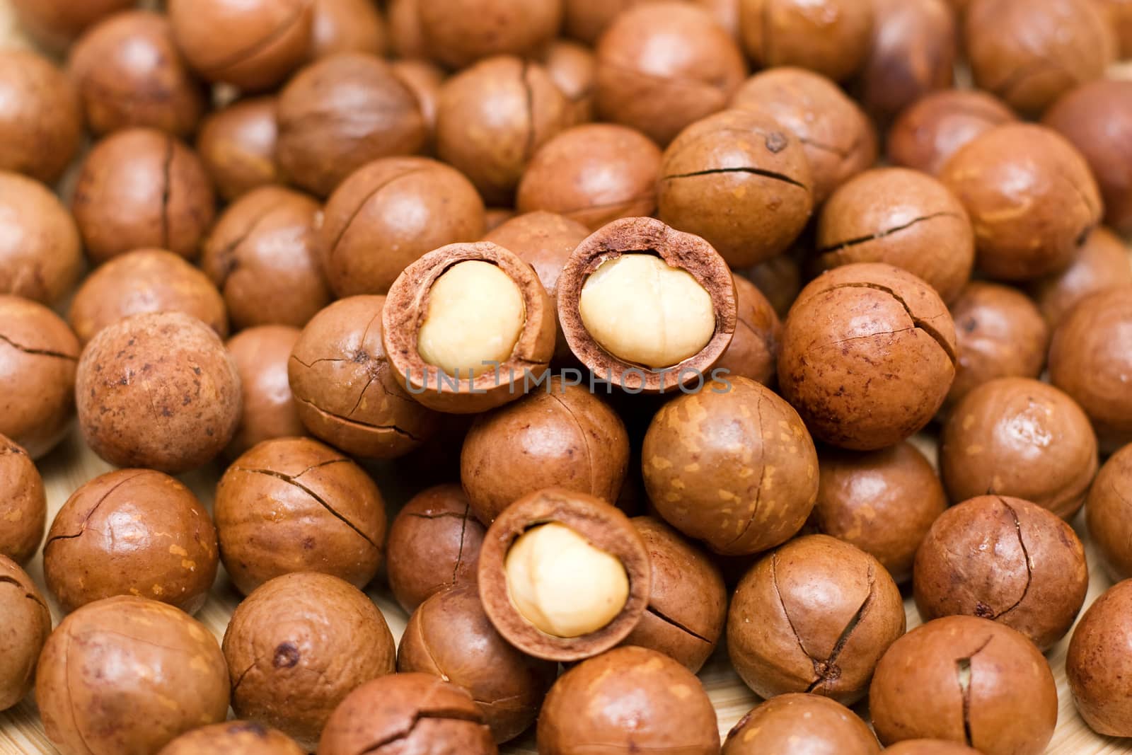 Macadamia nuts textue background by myyaym