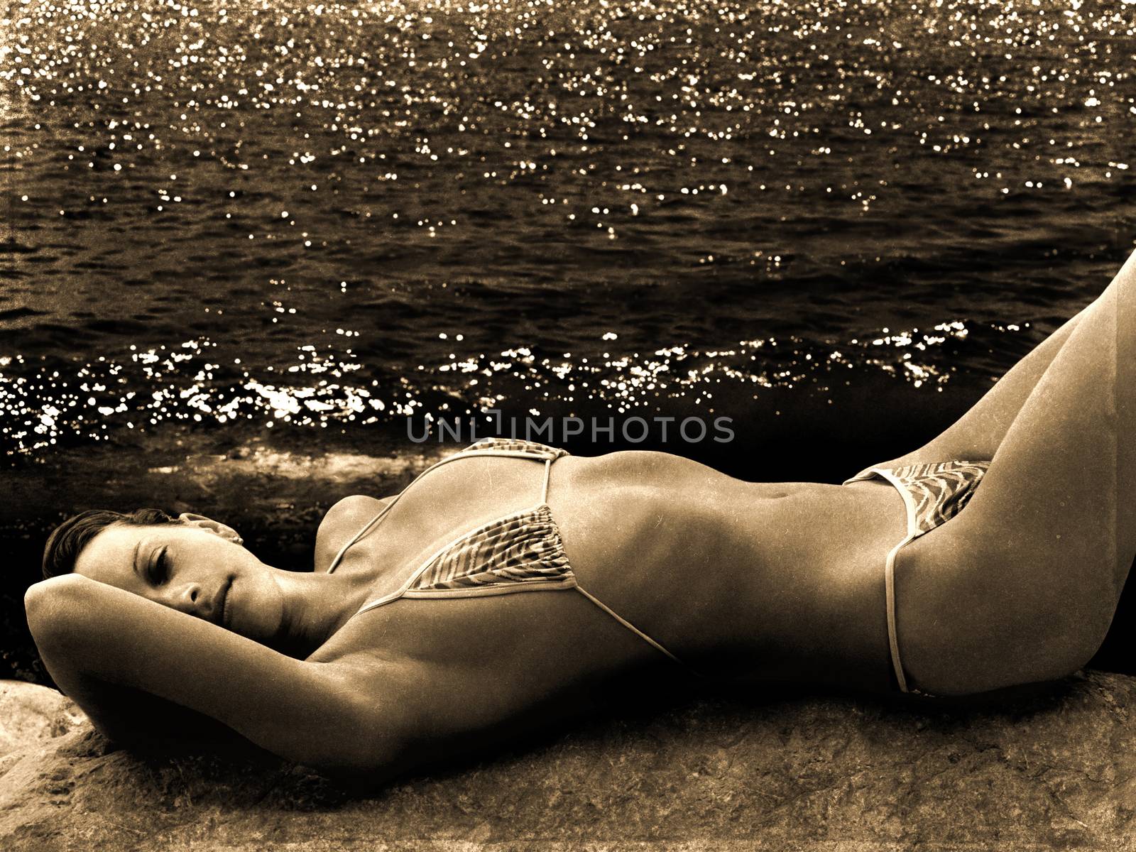 retro photo of woman which lies on the beach