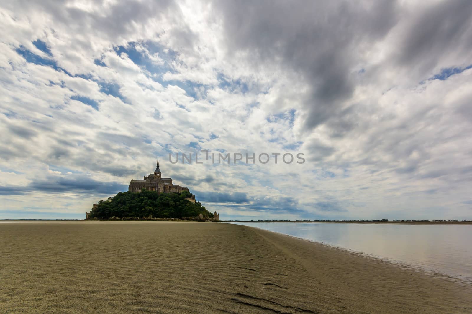 French catherdral on a island in a sandy bay