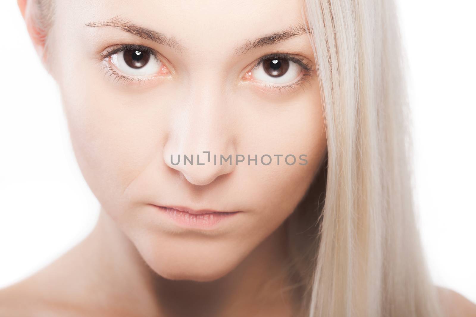 Studio portrait of beautiful caucasian girl with blond hair