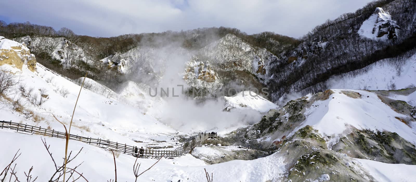 Noboribetsu onsen hell valley and bridge snow winter landscape national park in Jigokudani, Hokkaido, Japan