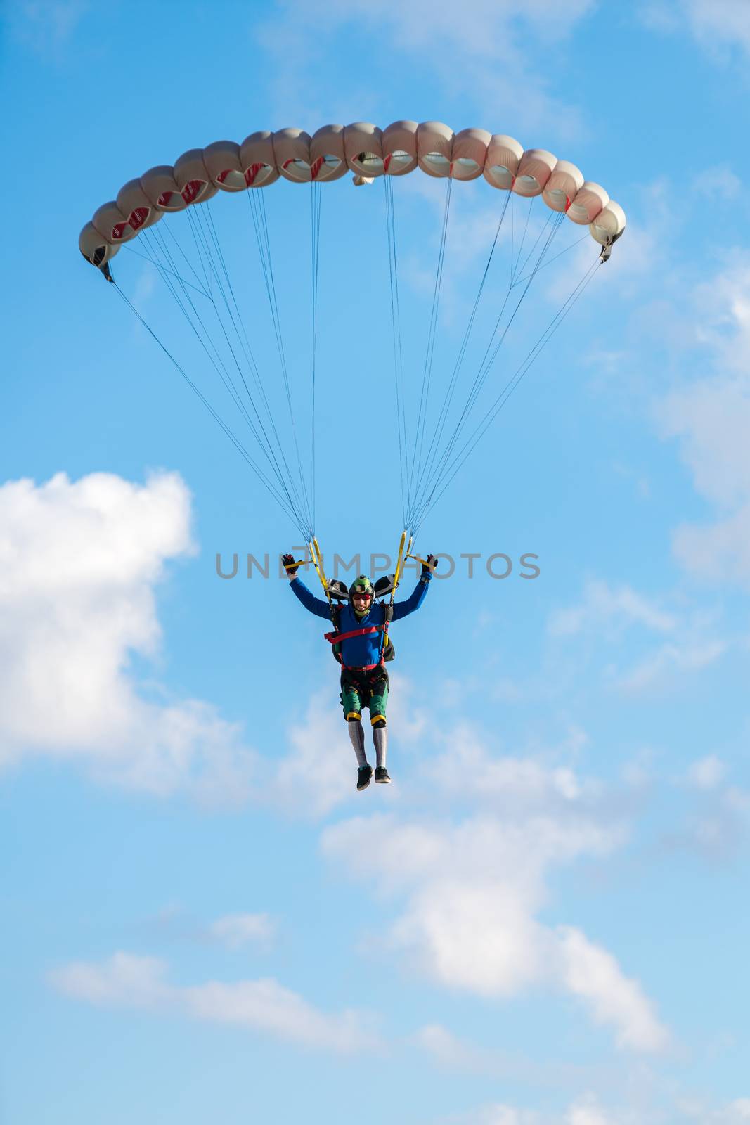 extreme sport skydiver closeup against the sky
