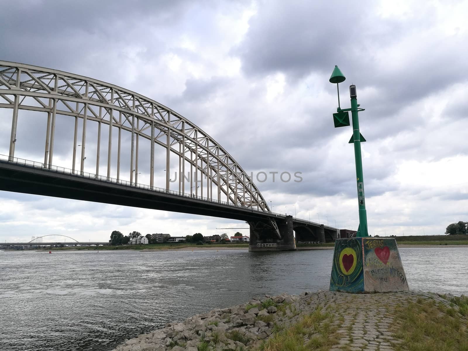 Main bridge over the channel in Nijmegen, Netherlans under a dramatic sky