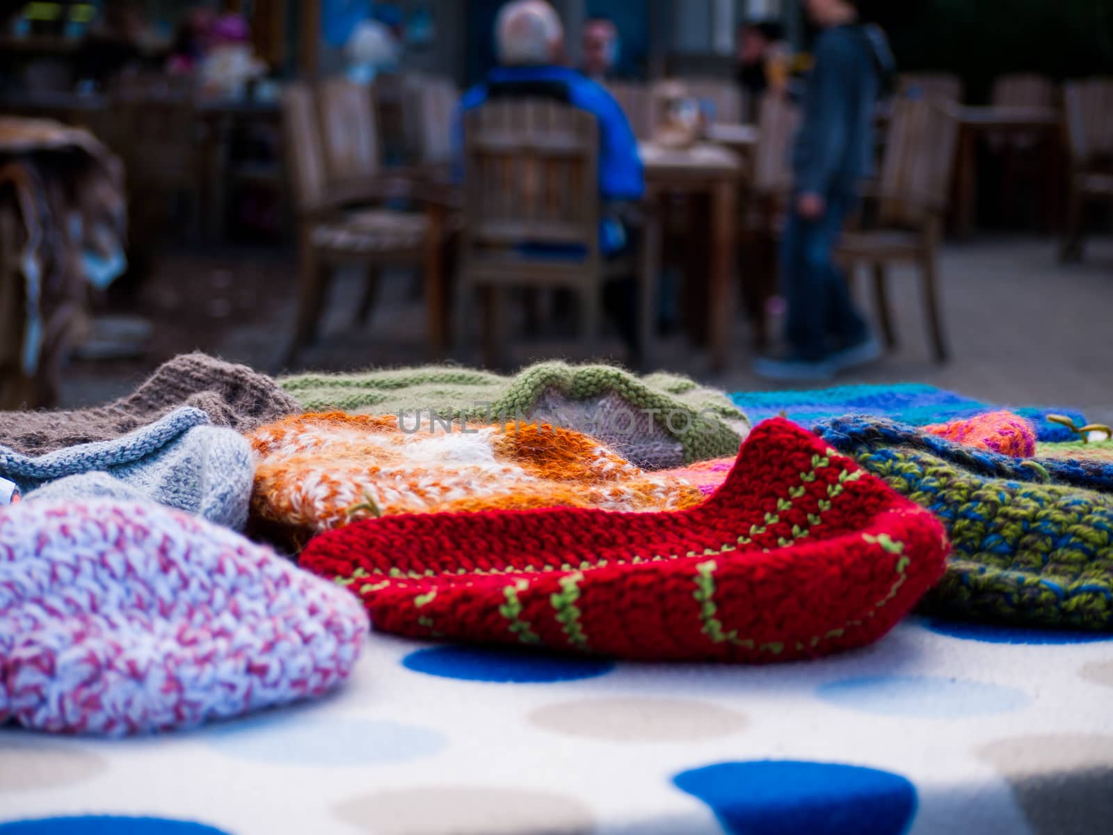 warm wooly beanies being sold at a market