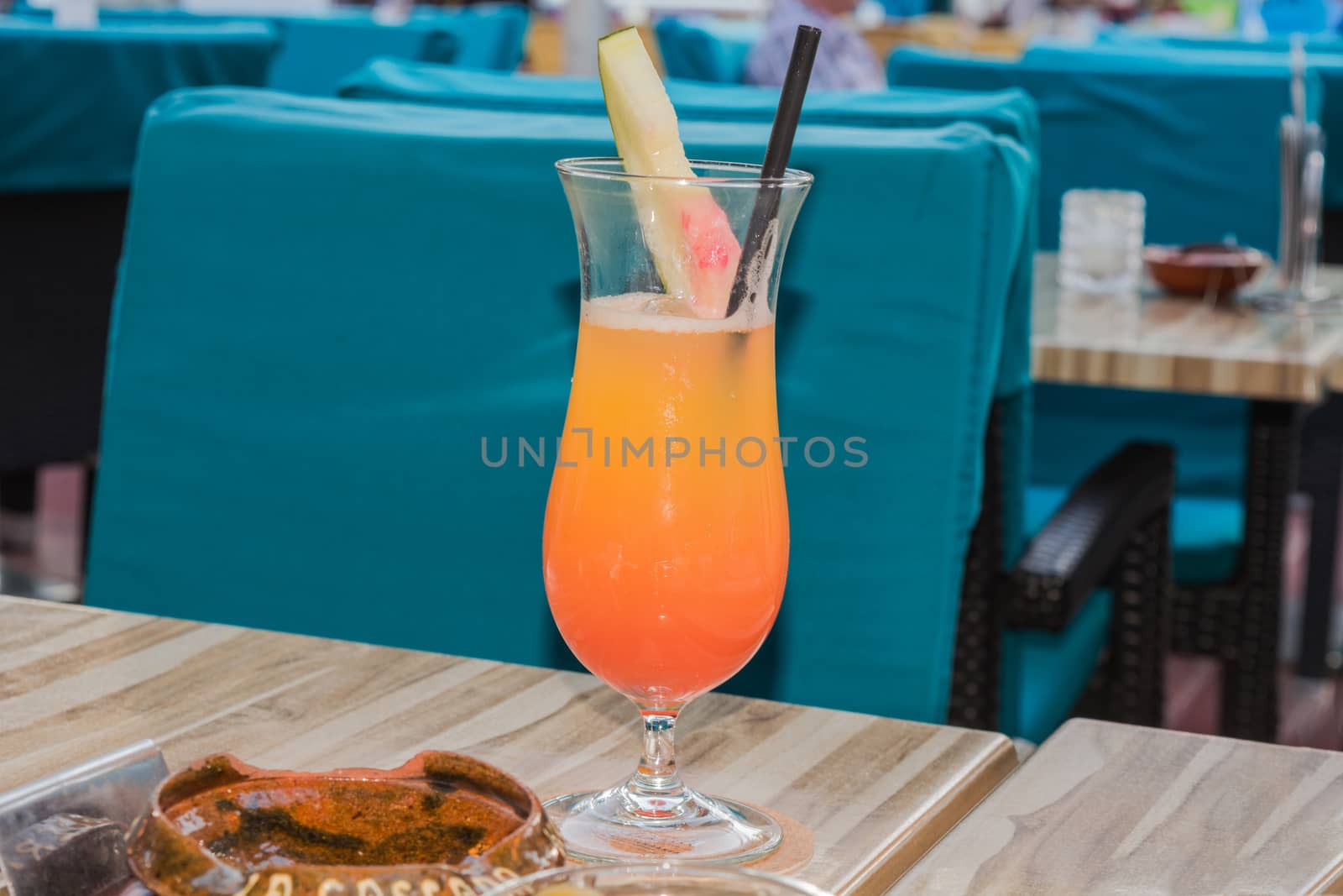 Cocktail Tequila sunrise on a table  by JFsPic