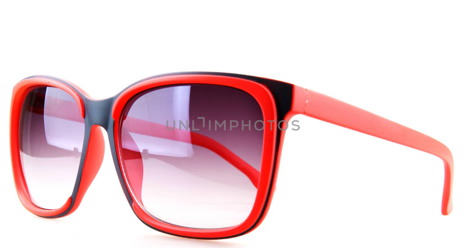 Pink sunglasses isolated on white.