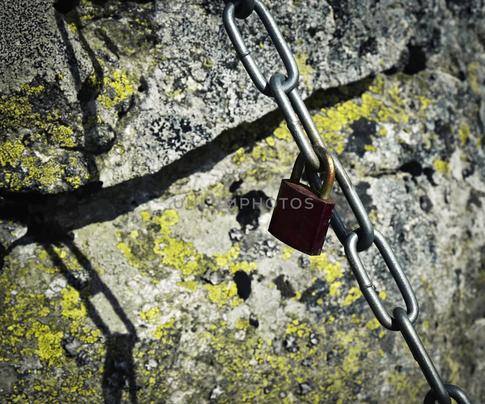 background or texture chain tied granite rocks