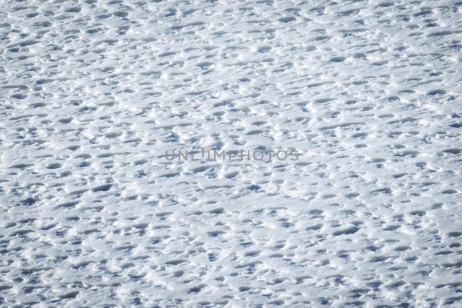 abstract winter background warm by wind pleated snow