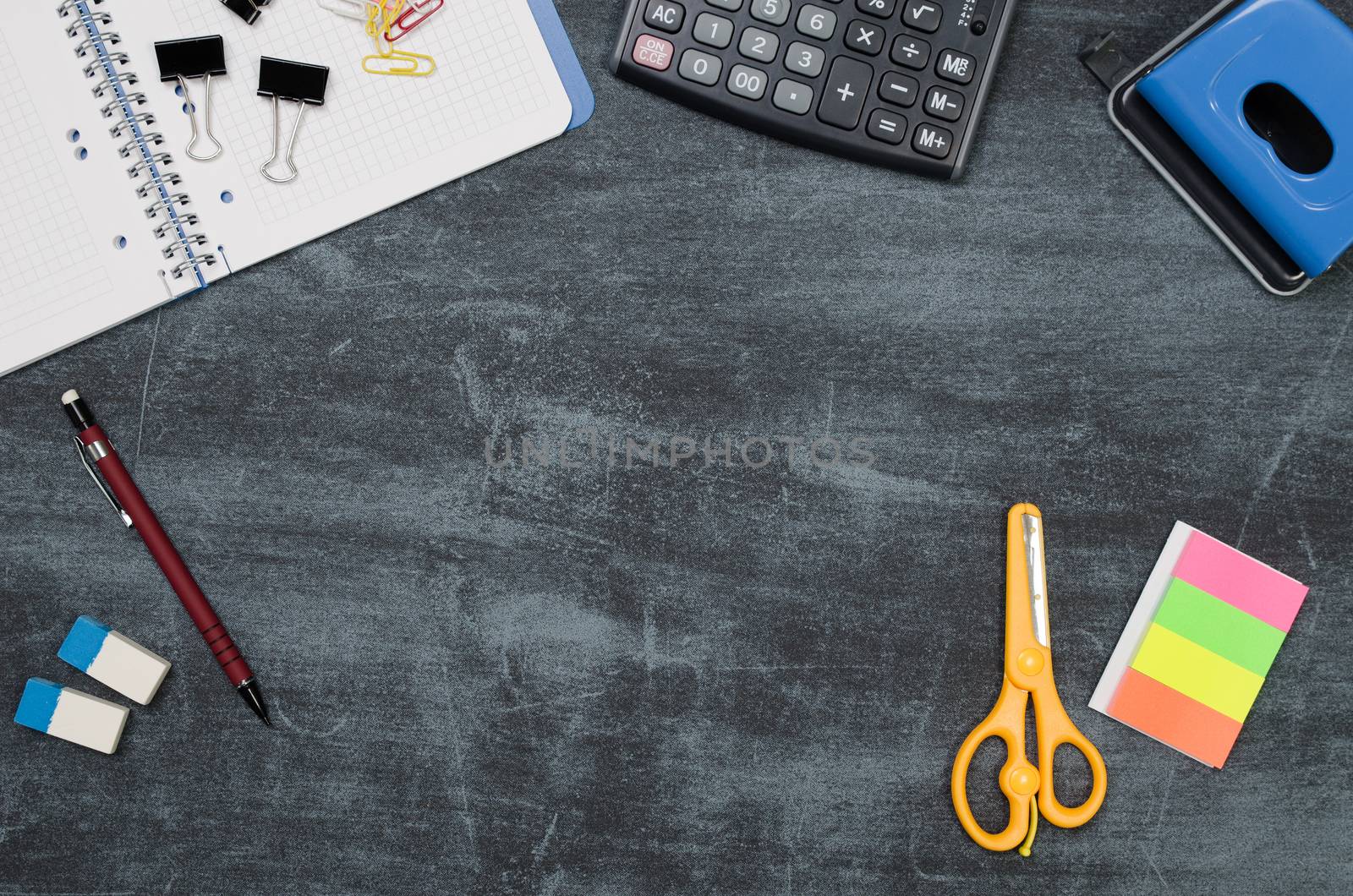 Business desk in office top view. Table with calculator, notepad, and office supplies. Copy space website banner concept