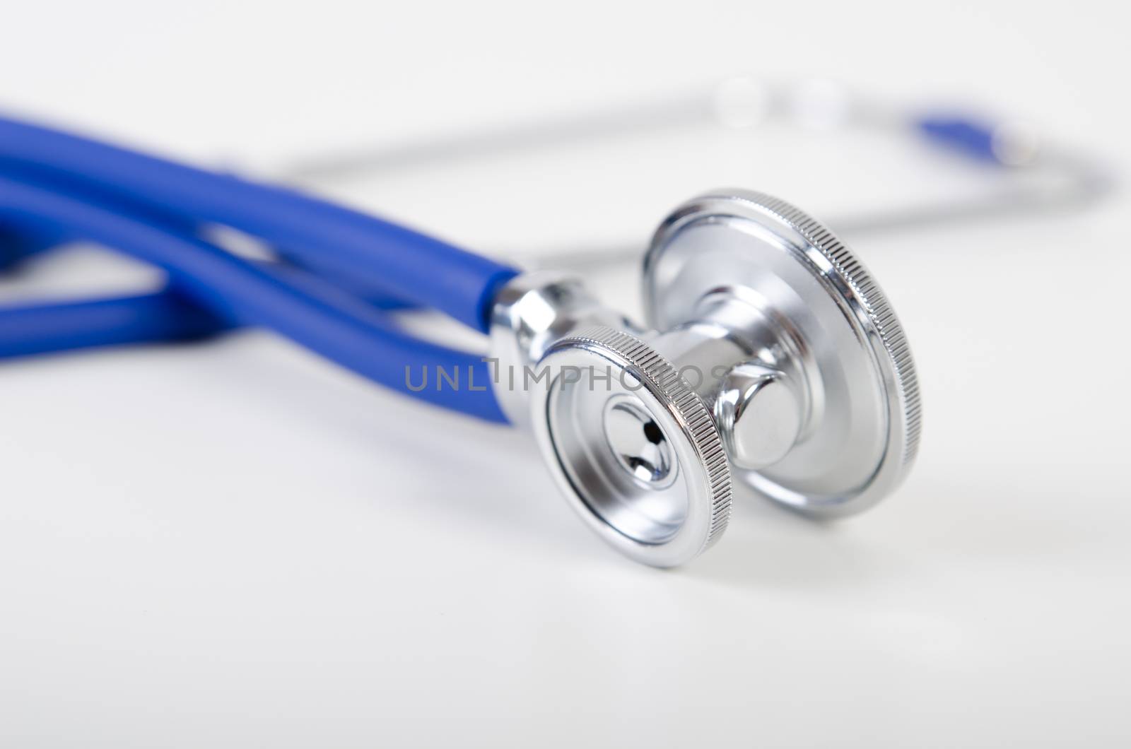 Blue stethoscope close up by simpson33