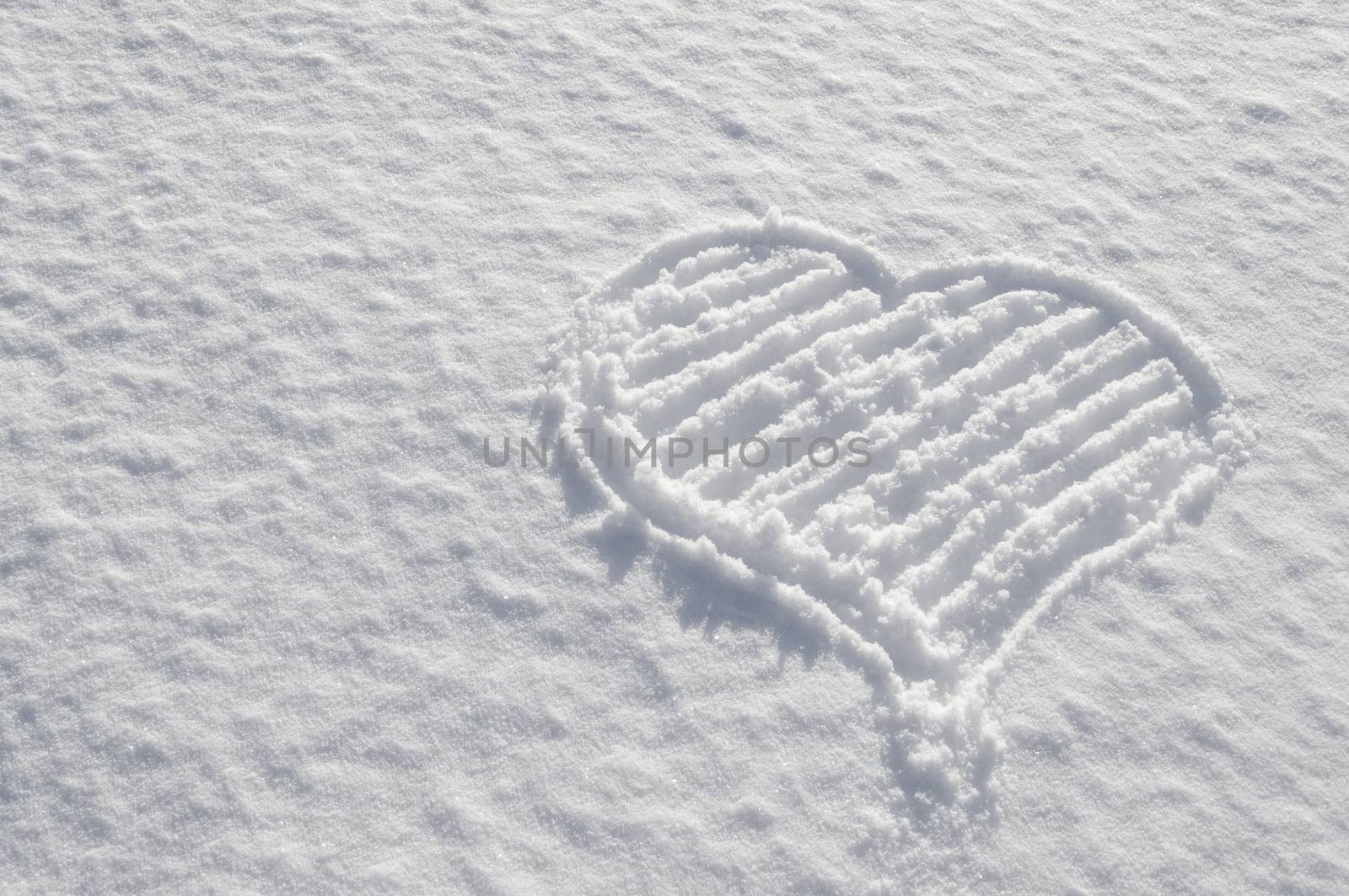 Romantic Valentines heart drawn on the snow love showing love and caring