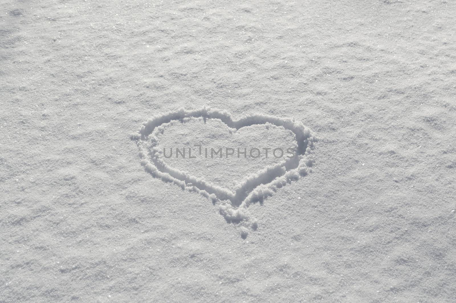 Romantic Valentines heart drawn on the snow love showing love and caring