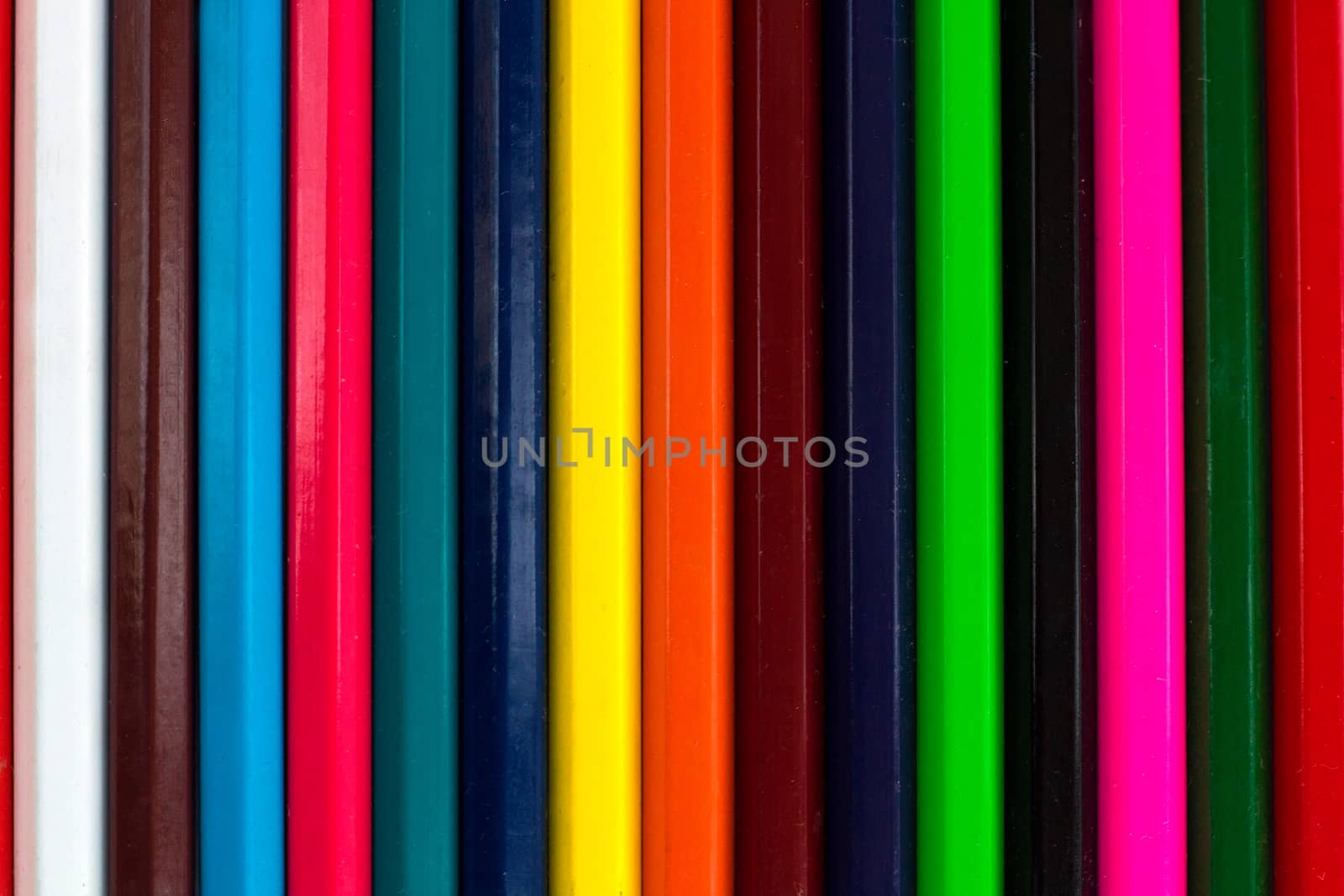 Vertical colourful stripes of multicoloured wooden pencils background background for presentations