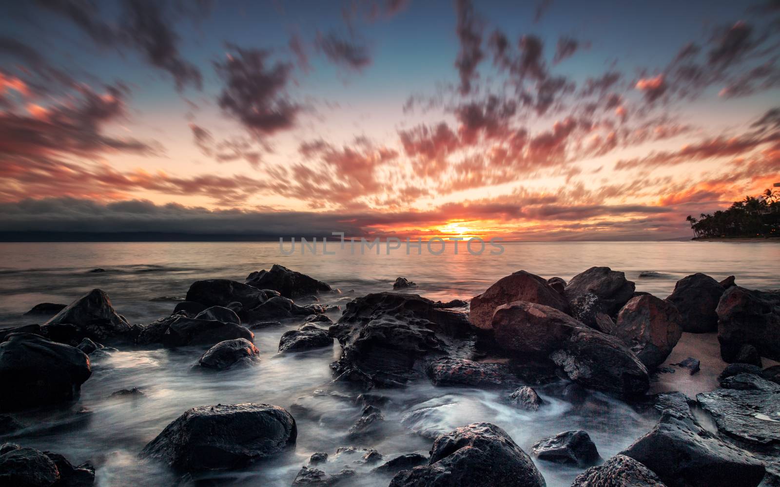 A dramatic sunset looking over the Pacific Ocean, Maui, Hawaii.