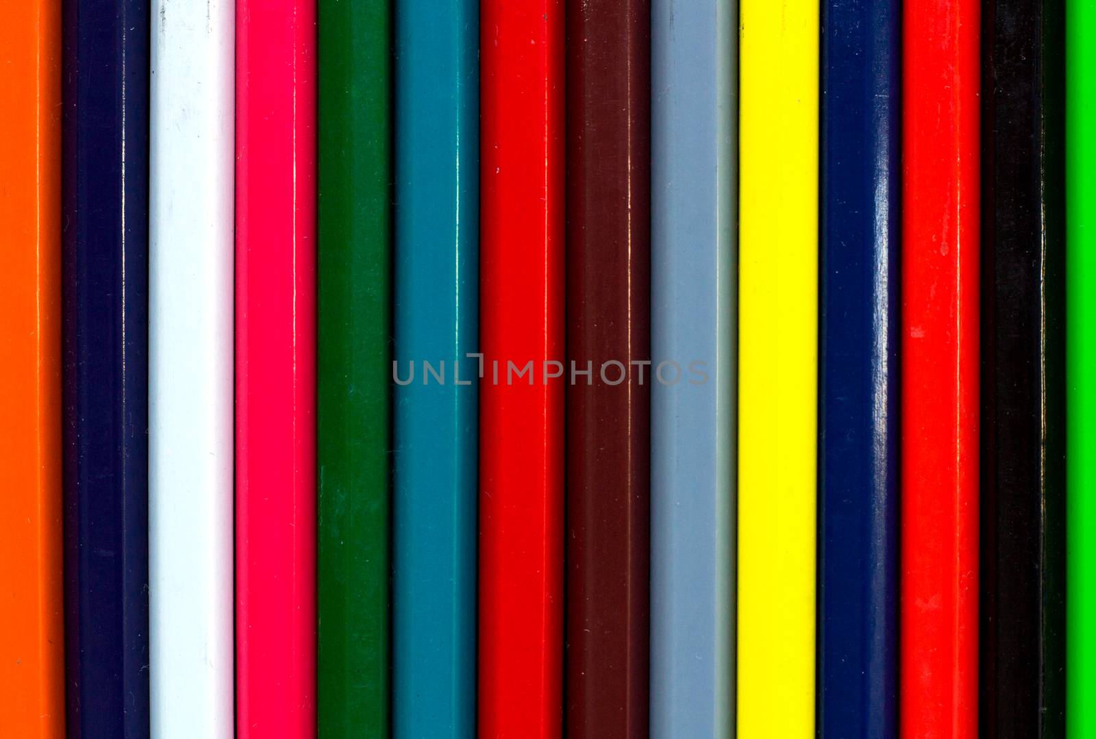 Vertical colourful stripes of multicoloured wooden pencils background background for presentations