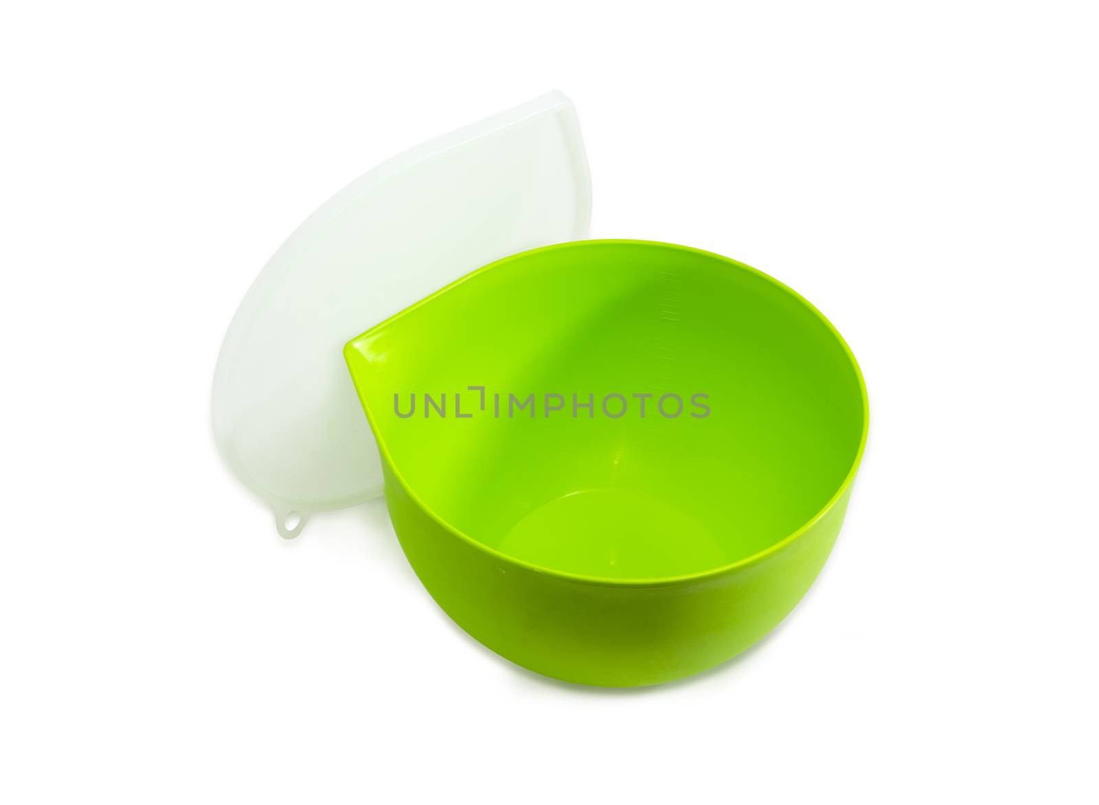 Green reusable plastic round food storage and cooking container for home use with open translucent cover on a light background
