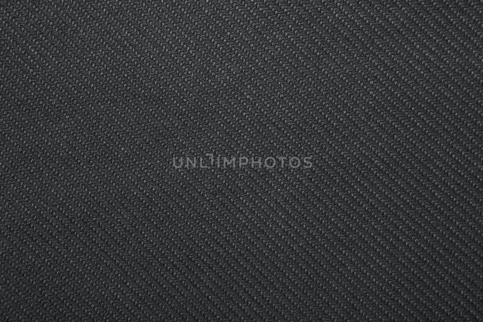 Black twill weave fabric pattern texture background closeup