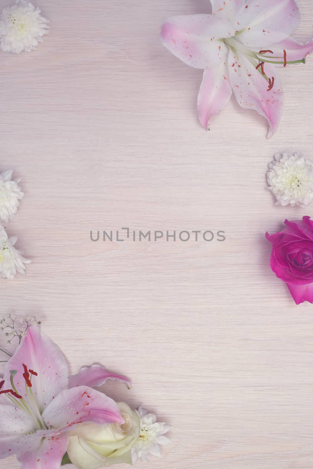 Lily flowers on wooden background with copy space, valentines day background