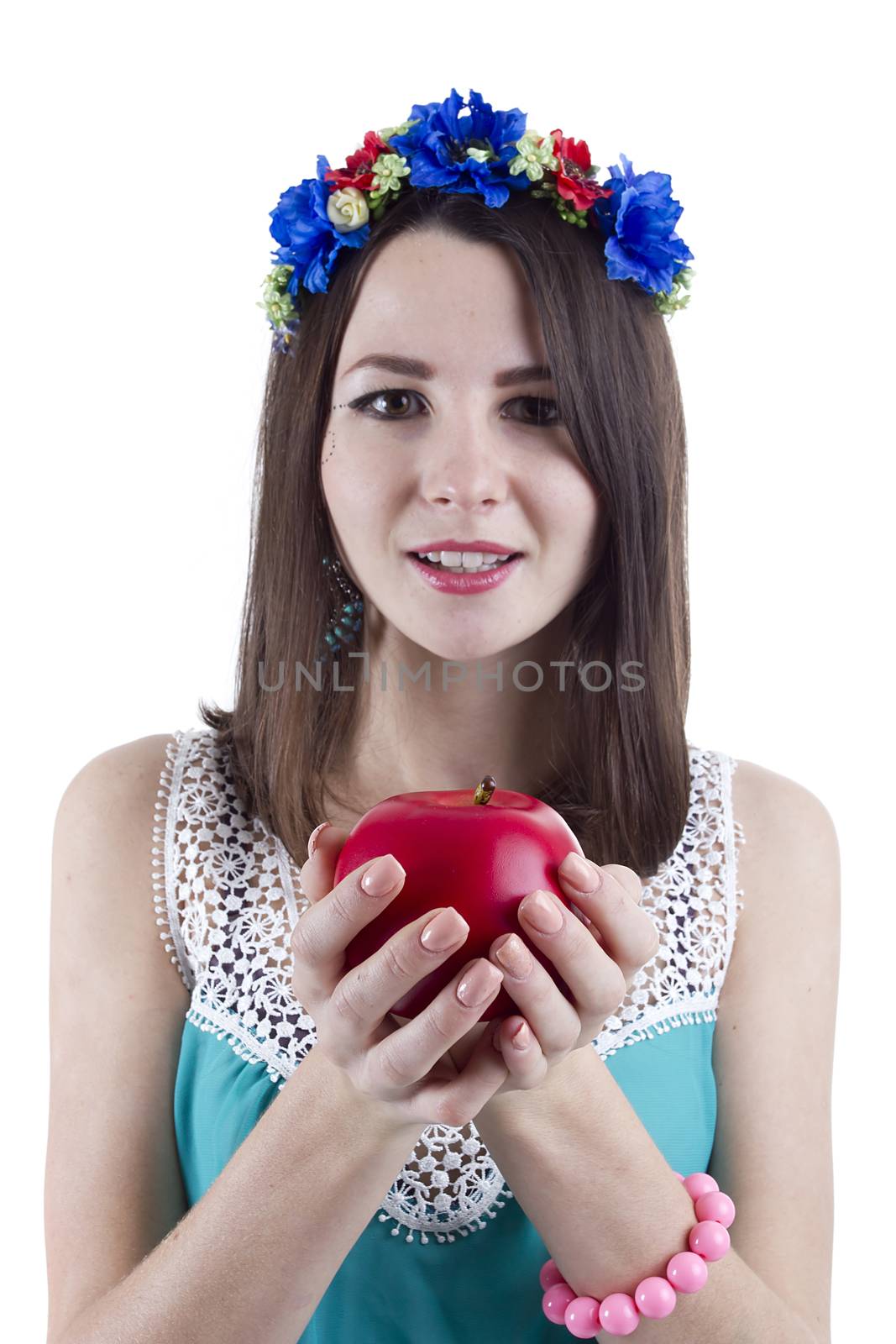 Pretty woman with an apple in his hand on a white background