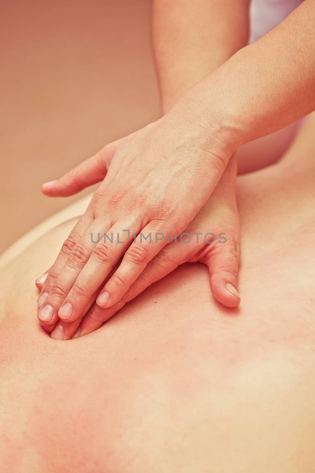 Woman having a massage at spa