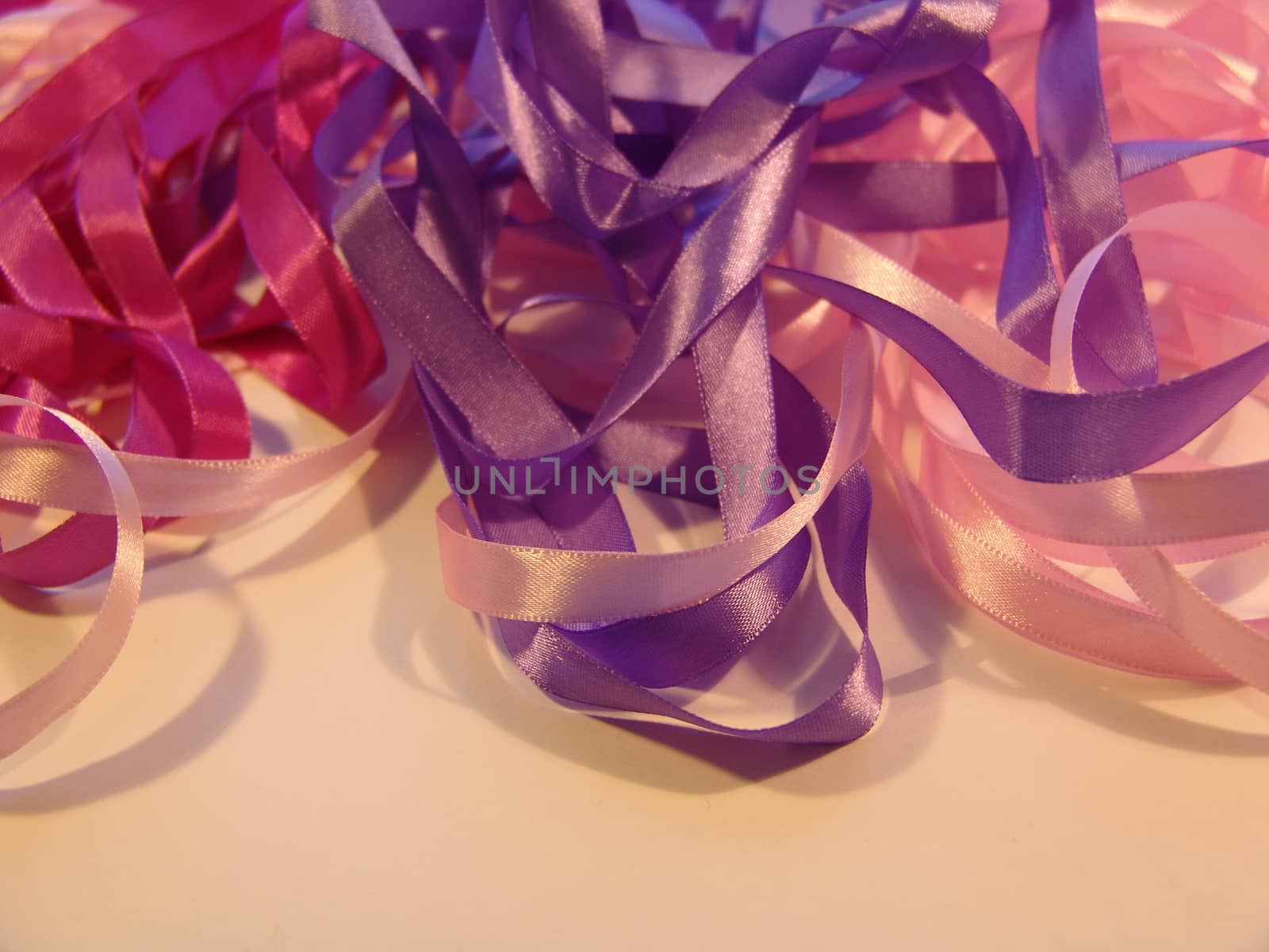 pink ribbon. purple ribbon. background by elena_vz