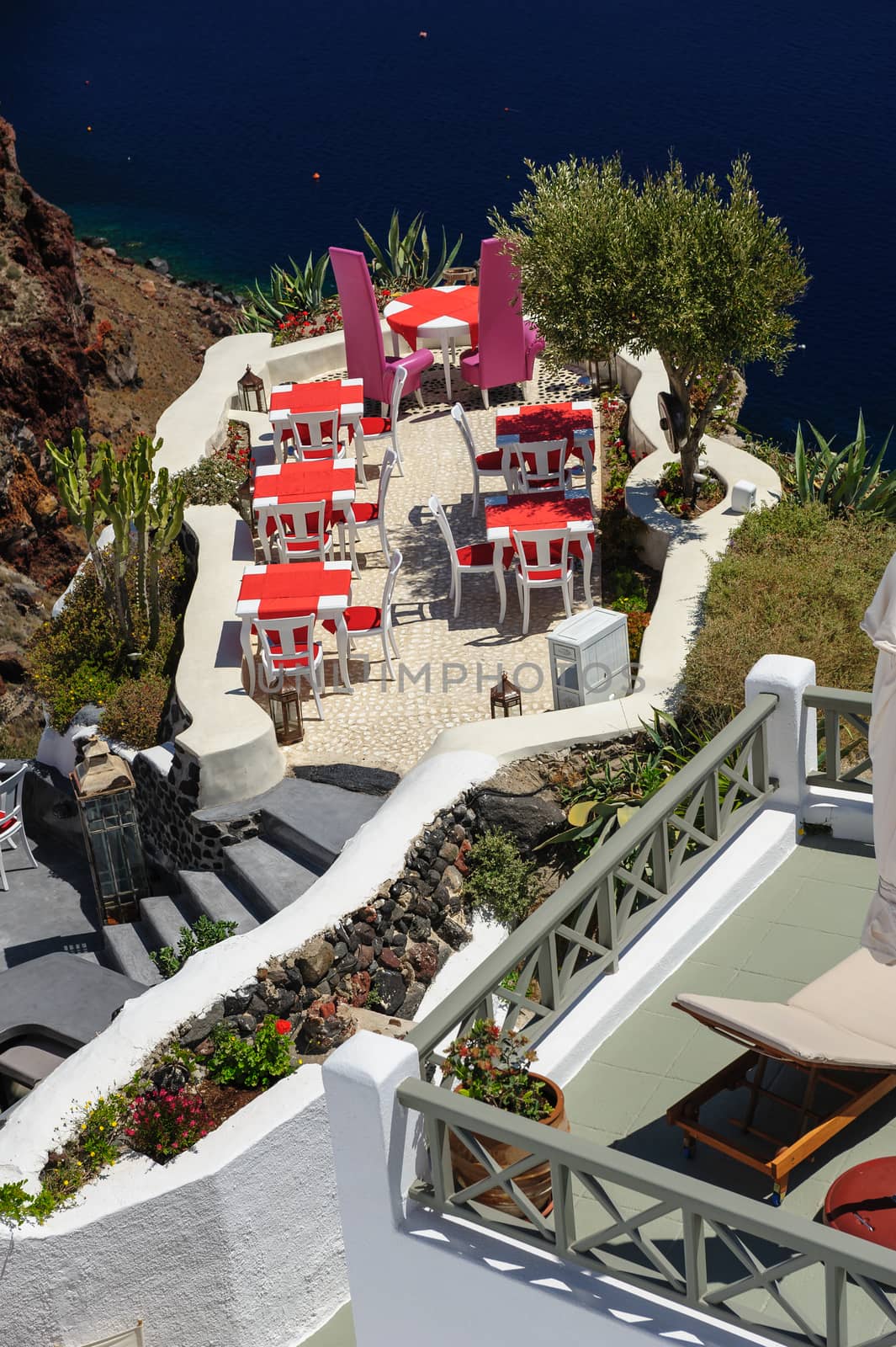 Luxury outdoor sea view cafe of Oia, Santorini, Greece.