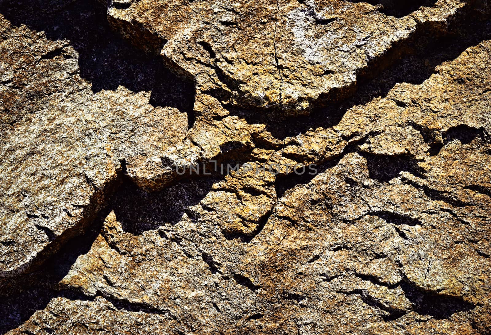abstract background shadows liven up the granite rock