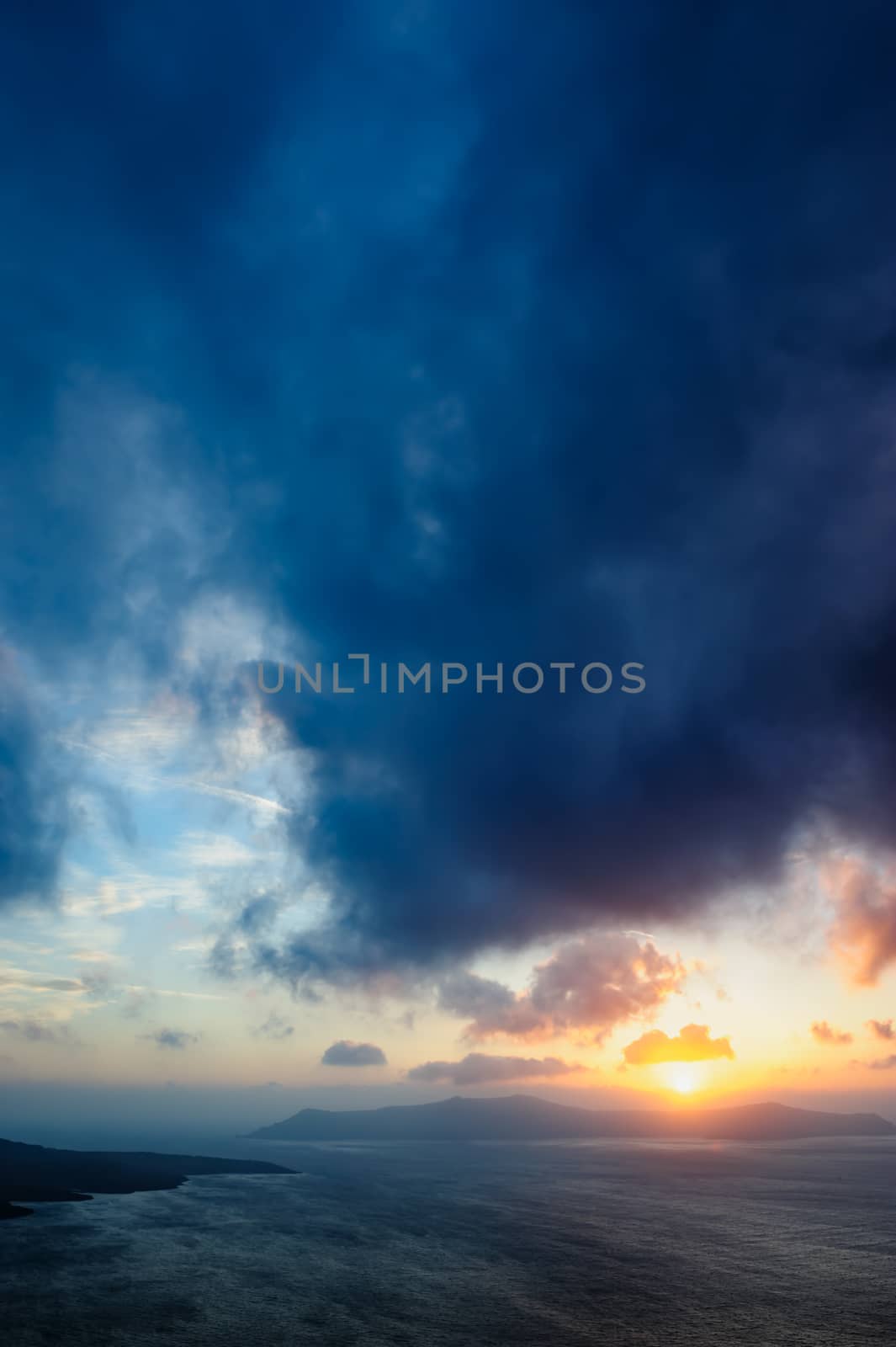 Sunset at Santorini, Greece. View to caldera sea. by starush