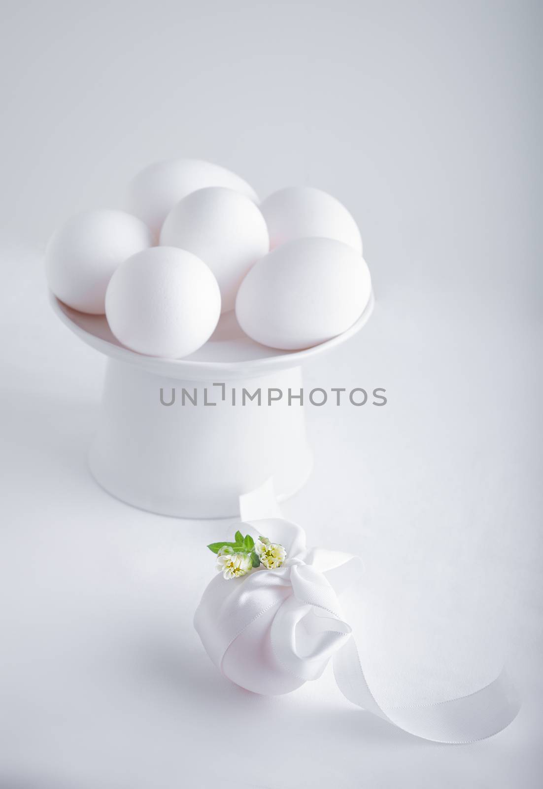 Eggs with flowers on a white background. Easter Symbols. by supercat67