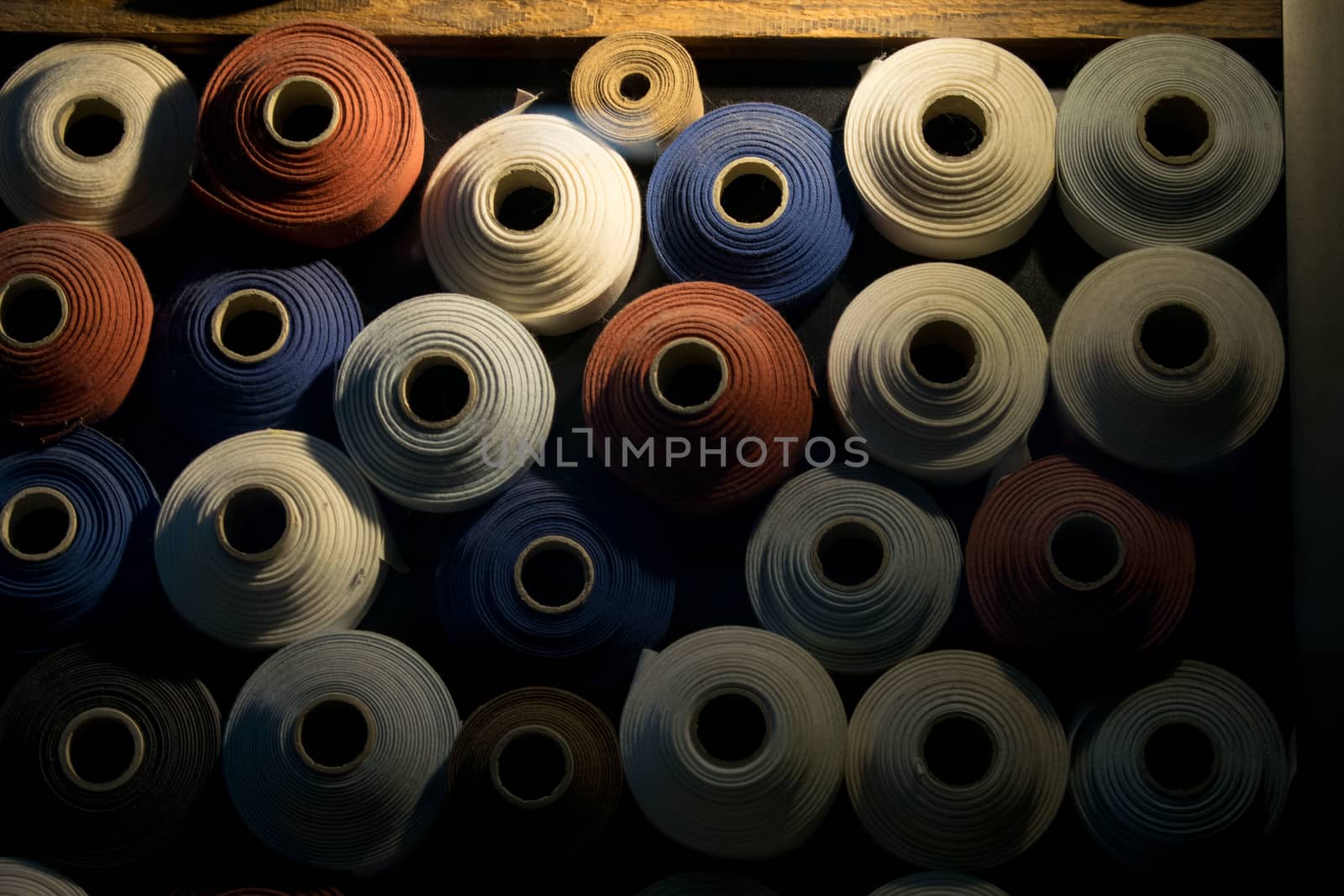 Assorted colored rolls in a shop of textile