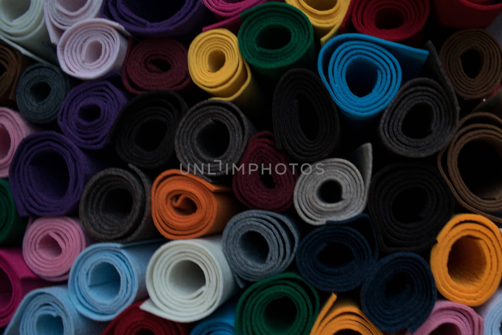 Assorted colored rolls in a shop of textile