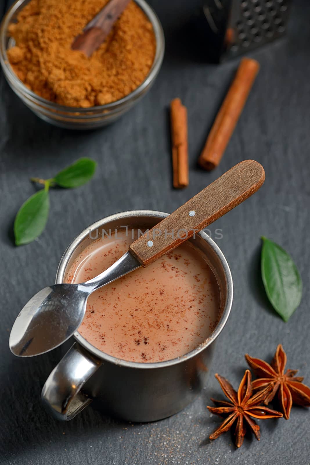 Cup of hot chocolate, cinnamon sticks  by jordachelr