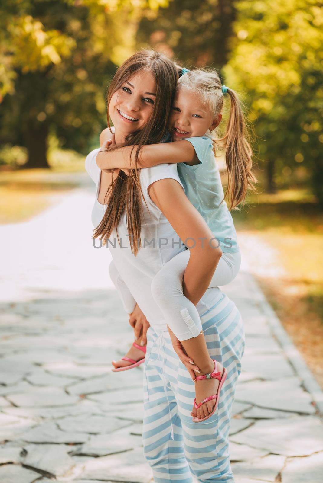 Cute Little Girl And Her Mom by MilanMarkovic78