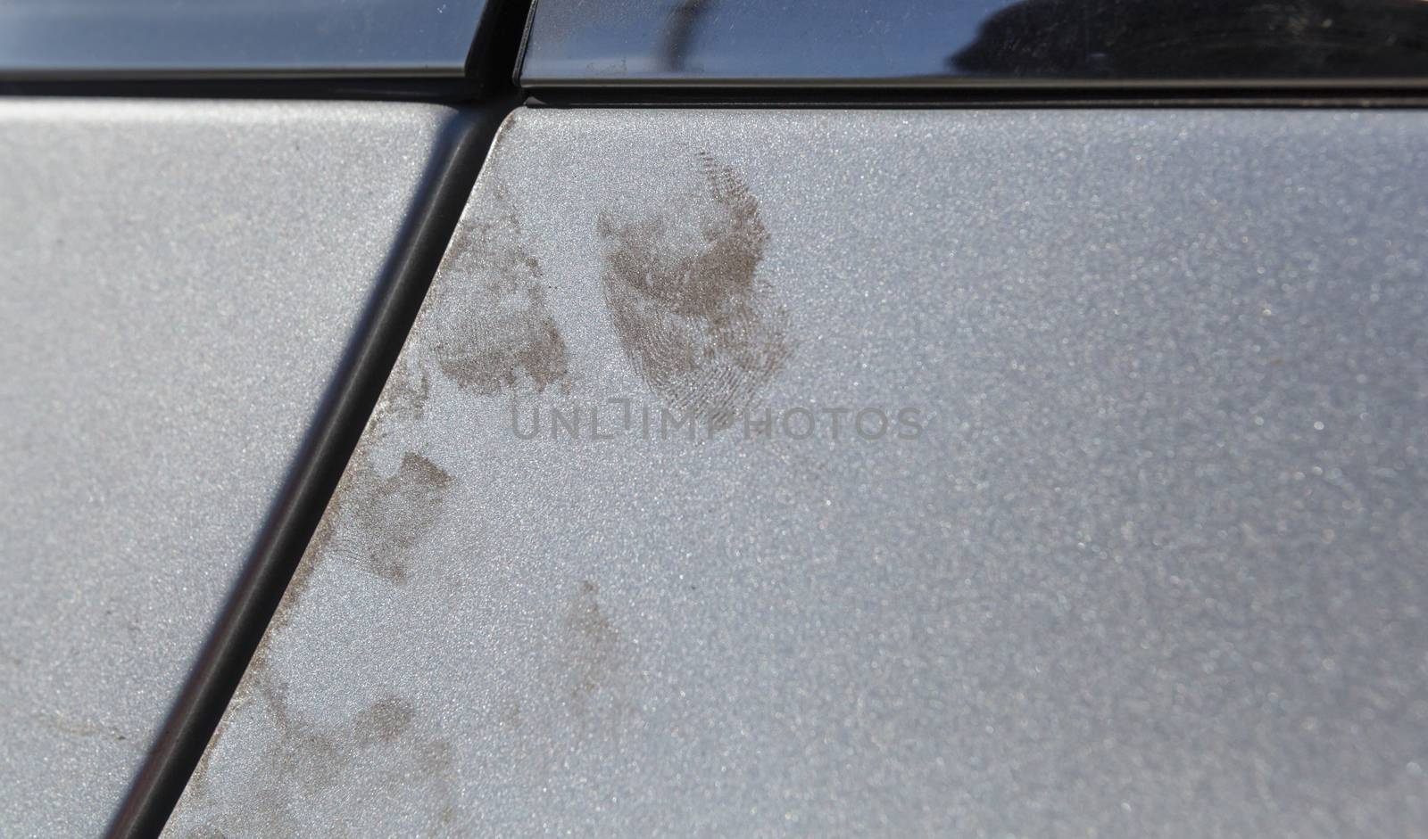 Automobile theft. Evidence on the door of a car in the form of fingerprints