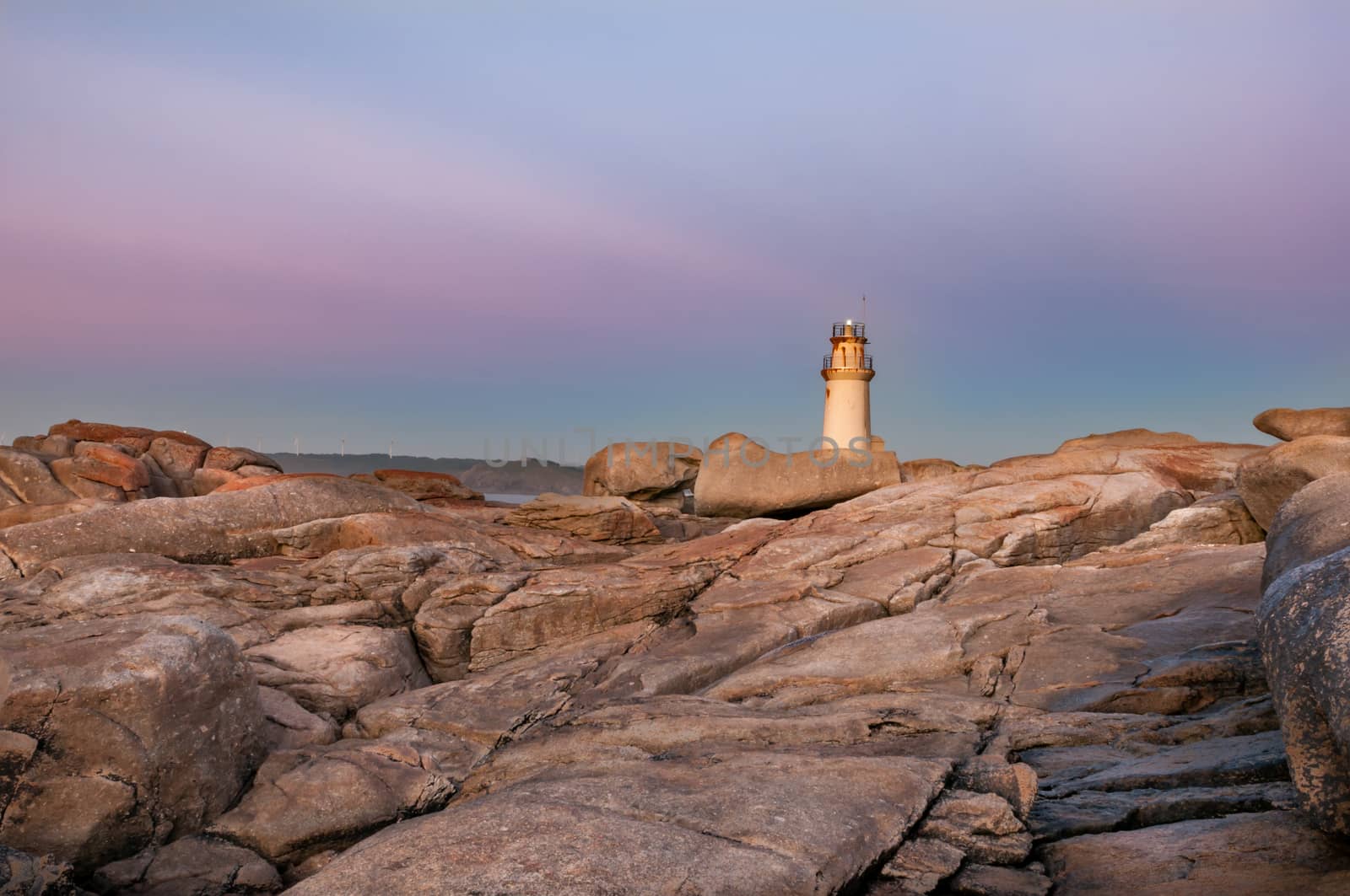 The lighthouse of Muxia at sunset. Muxía, A coruna, Spain