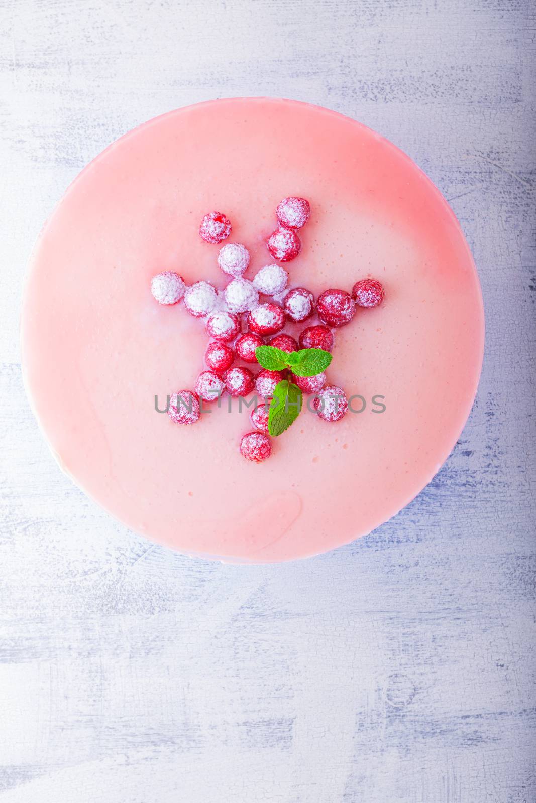 Raspberry yogurt cake served on a white table