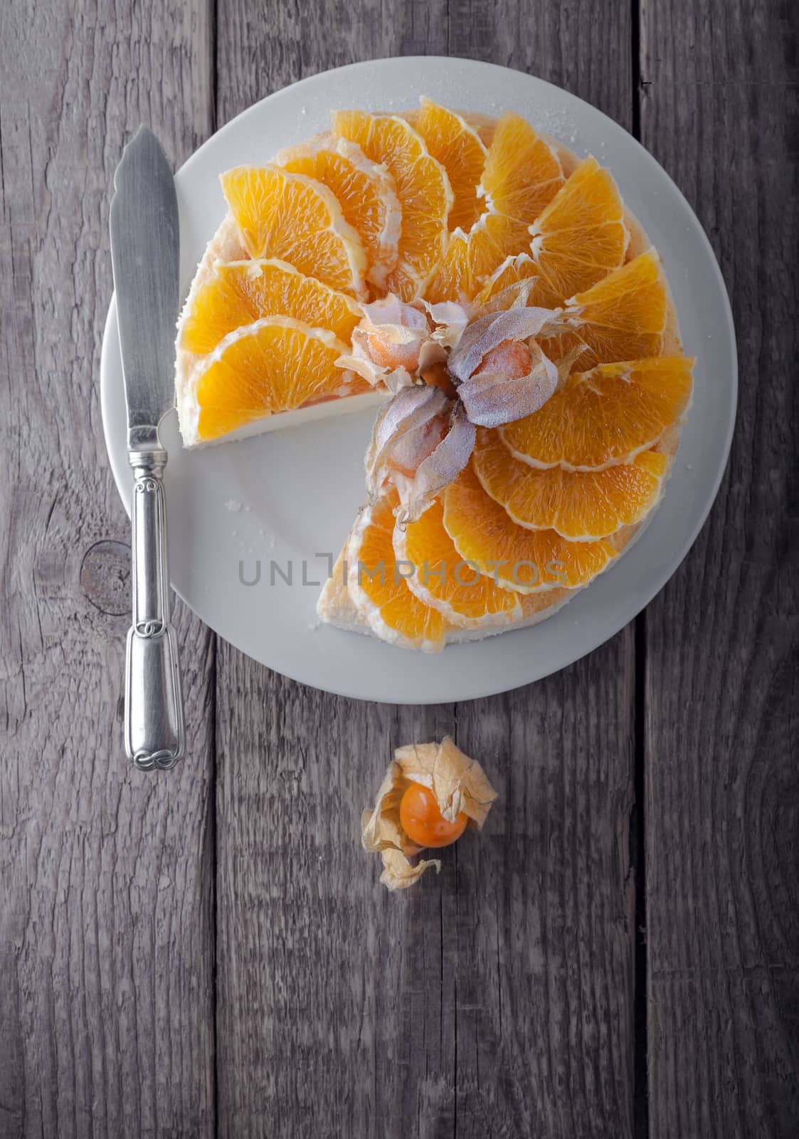 Cheesecake decorated with oranges and physalis. by supercat67