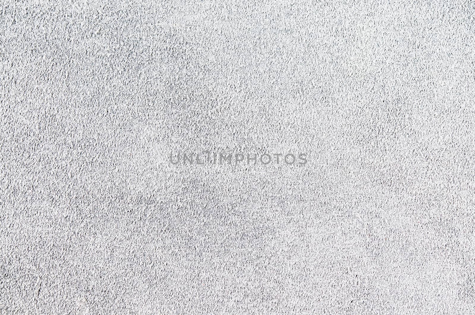 Light grey suede soft leather as texture background. Close up shammy leather texture