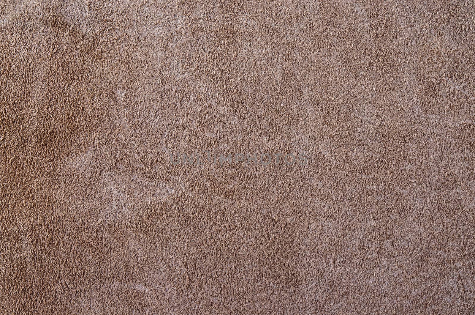 Brown leather texture closeup. Useful as for background.