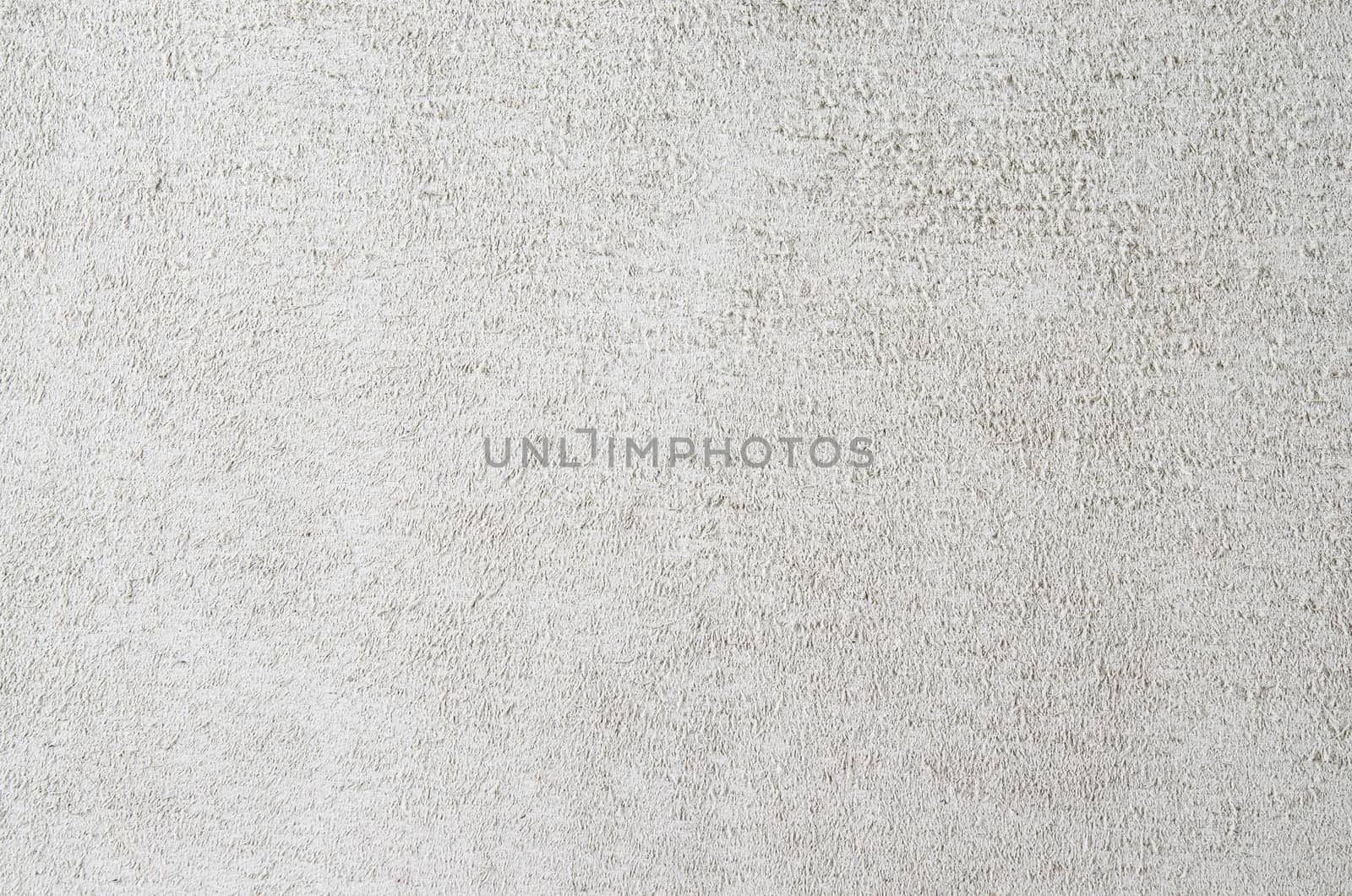 Light grey suede soft leather as texture background. Close up shammy leather texture