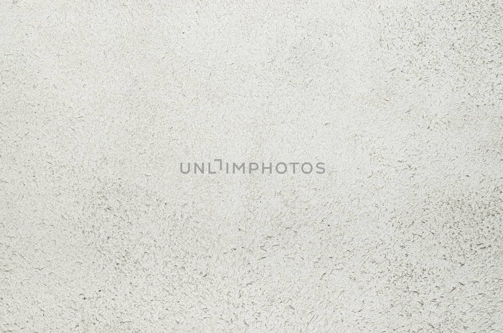 Light grey suede soft leather as texture background. Close up shammy leather texture