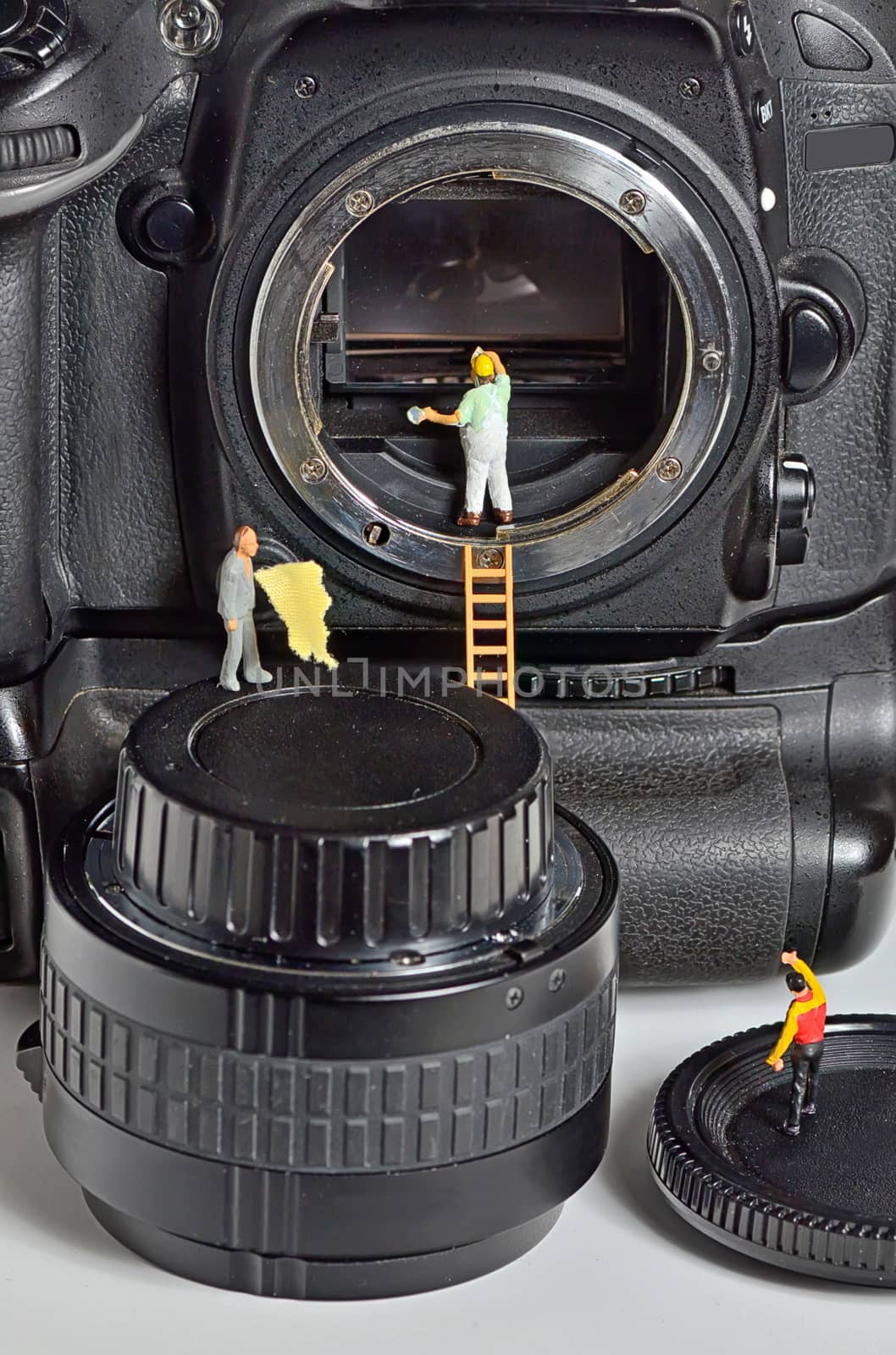 Camera sensor cleaning by figurines