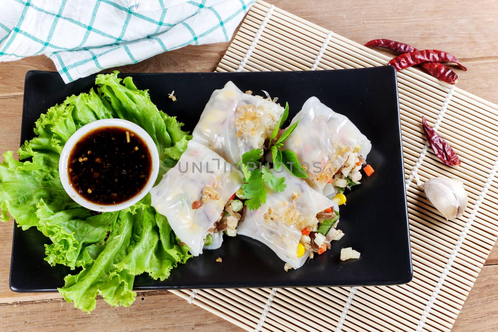 Noodle tube is appetizer menu Asia. made from noodle stuffed with pork and vegetables cooking by steamed.