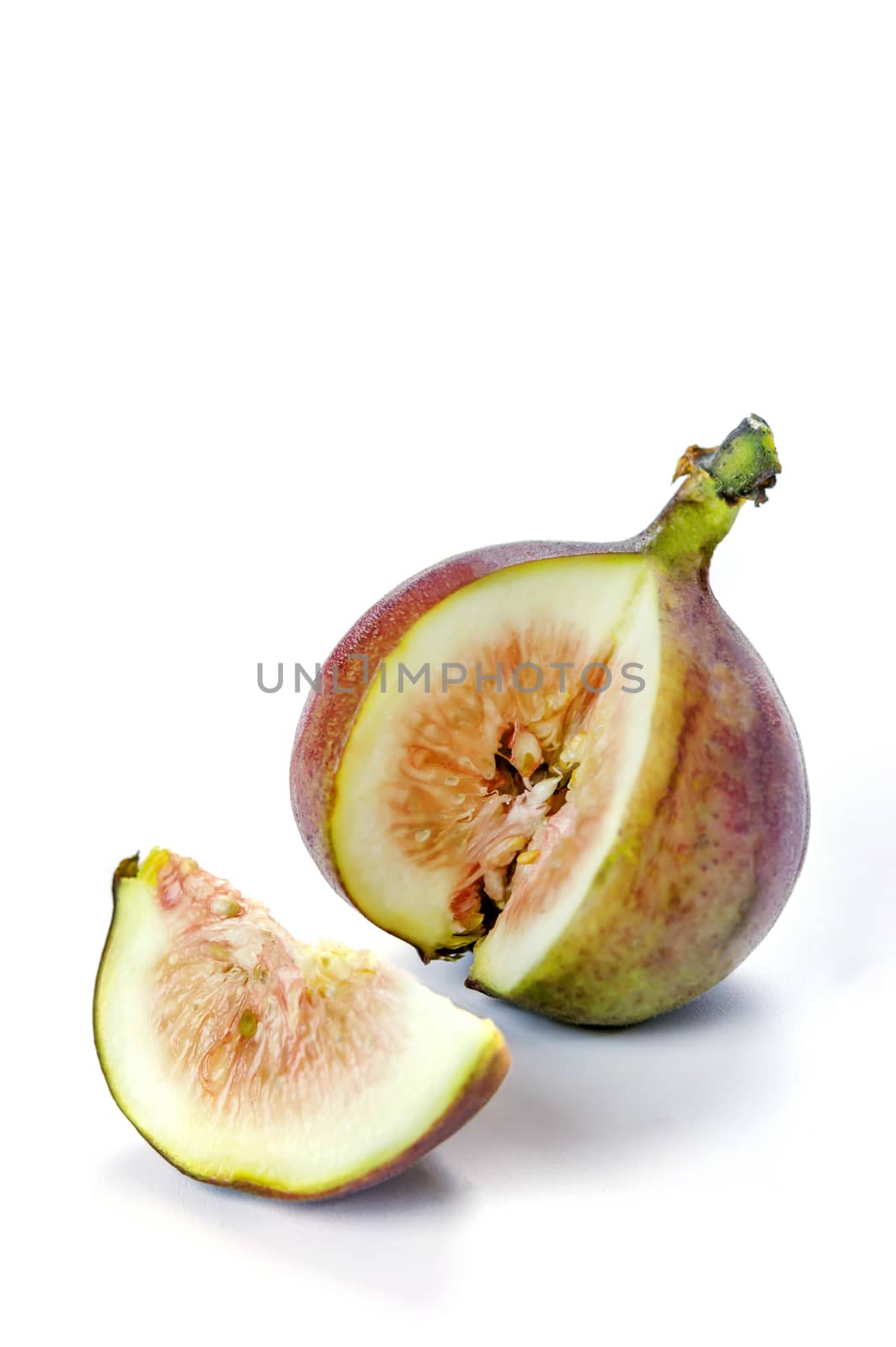 sliced fresh figs fruit on white background