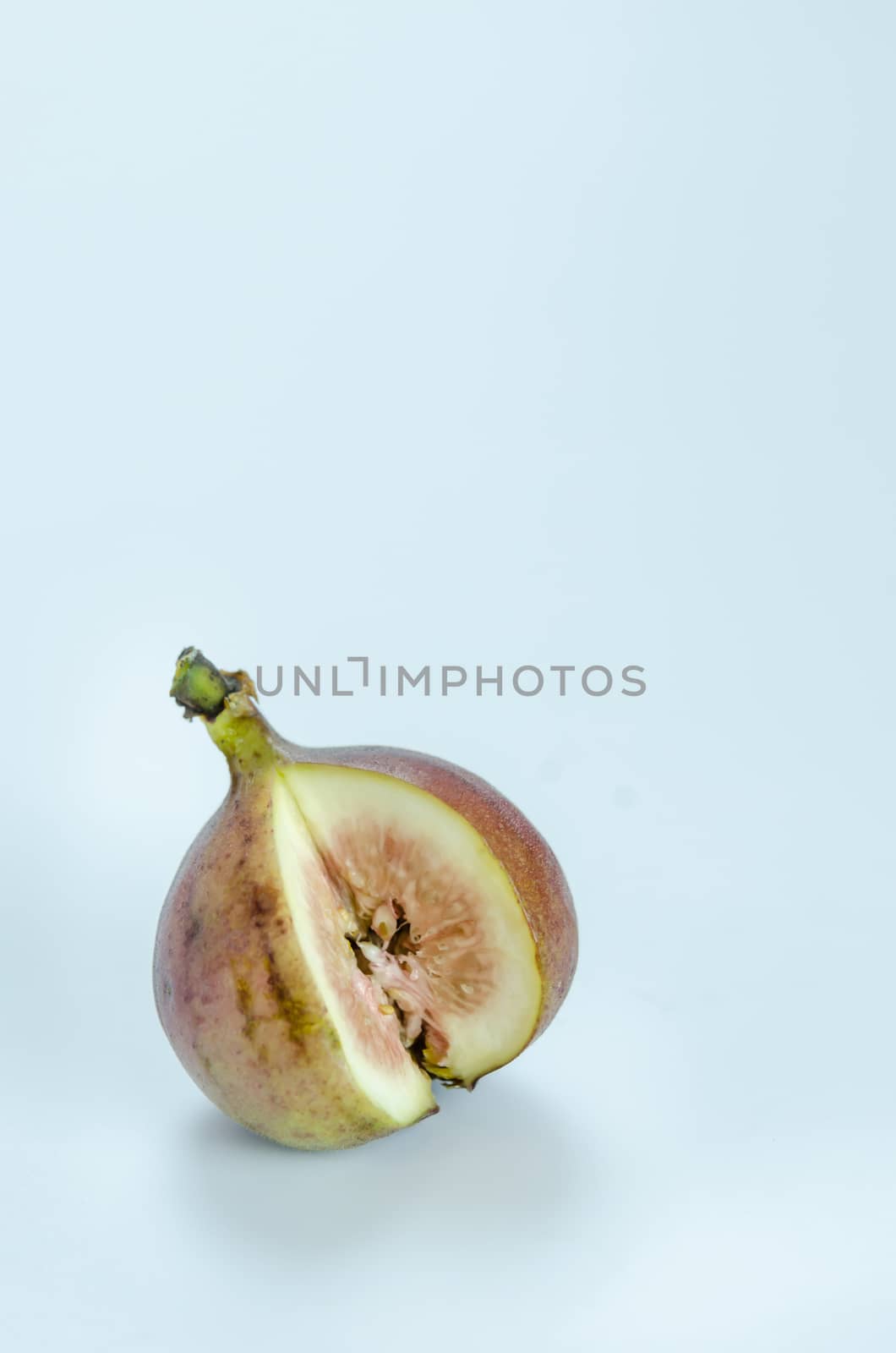 sliced fresh figs fruit on white background